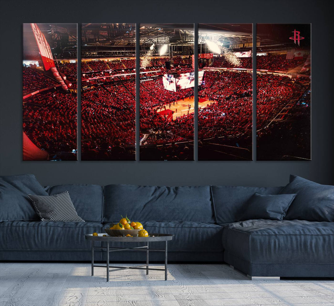 A crowded basketball arena with red lighting hosts a Houston Rockets game.