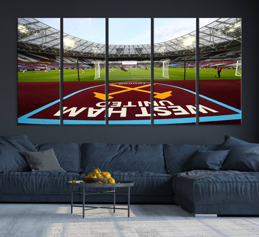 A soccer stadium with the West Ham United FC logo.