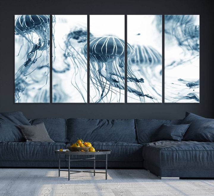 The "Abstract Jellyfish Wall Art Canvas Print" in high resolution is beautifully displayed as a triptych on a dark wall. Experience museum-quality canvas and enjoy free shipping with this stunning piece.