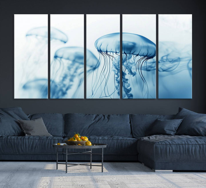 A breathtaking triptych of the Blue Jellyfish Wall Art Canvas Print decorates the space, beautifully highlighted by an overhead lamp. Each canvas is created on museum-quality material using high-resolution printing and includes a UV-protective coating to ensure long-lasting vibrancy.