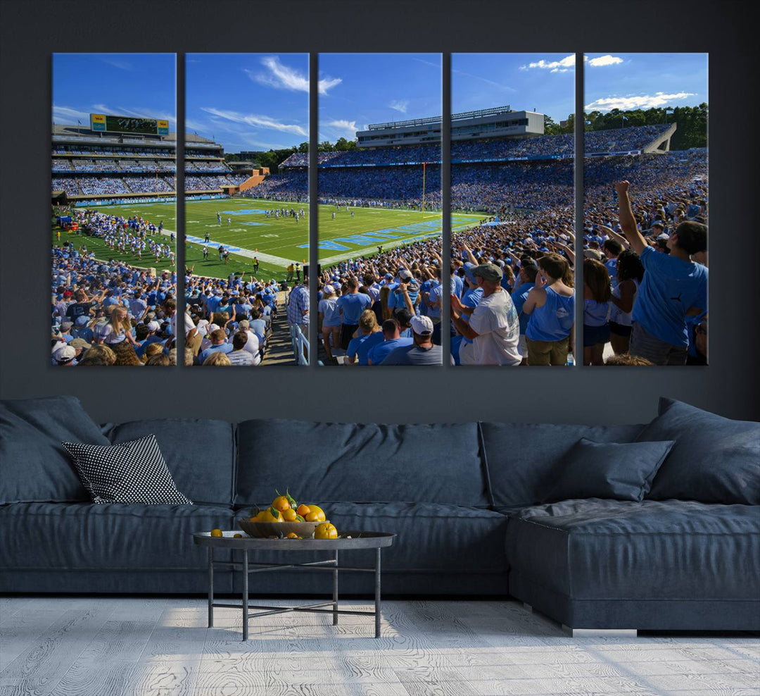 A gallery-quality canvas wall art print featuring the University of North Carolina Tar Heels Football Team and Chapel Hill's Kenan Memorial Stadium adorns the cafe wall.