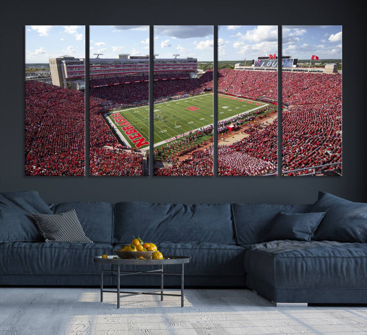 The University of Nebraska Cornhuskers Football Team Print showcases a vibrant triptych of Lincoln Memorial Stadium, depicting a packed football stadium filled with energetic fans. This handmade art piece is crafted in the USA and printed on premium canvas for a gallery-quality finish.