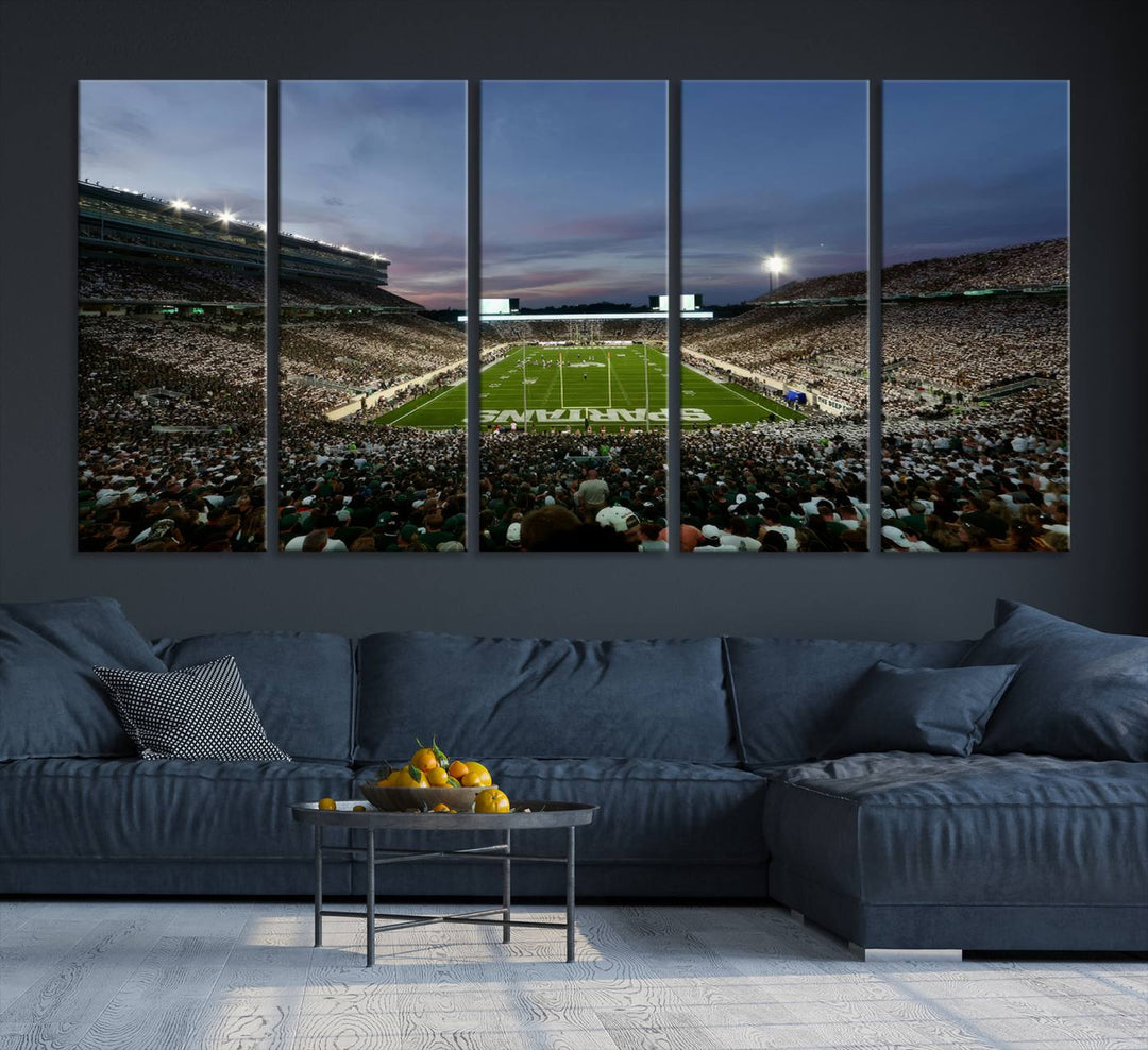 Wall art featuring a stadium at dusk with full stands—ideal for the Michigan State Spartans Football Team Canvas Print.