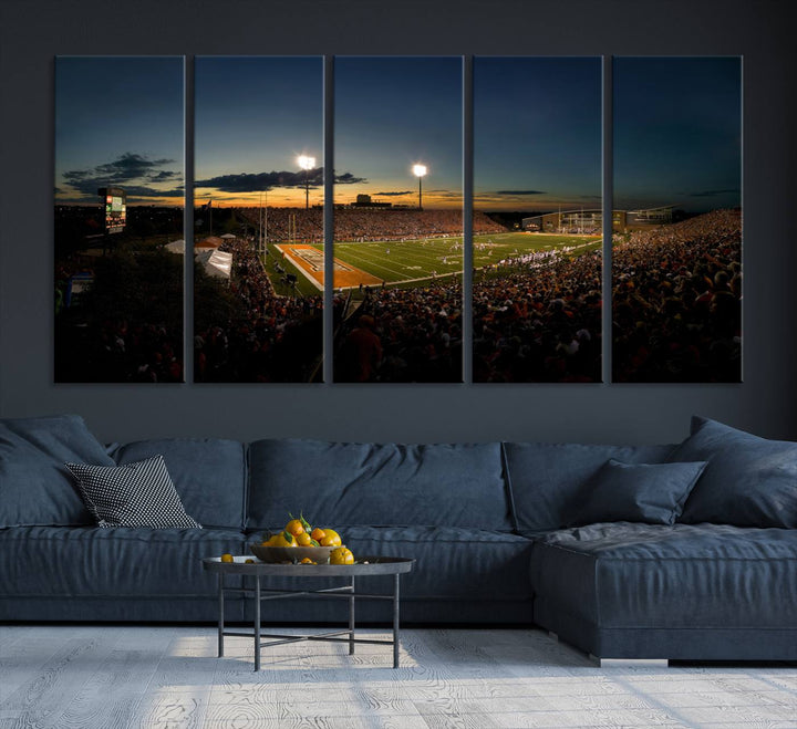 Ball State Cardinals Football Team Print - Muncie Scheumann Stadium Canvas featuring a sunset, floodlights, and lively crowd.