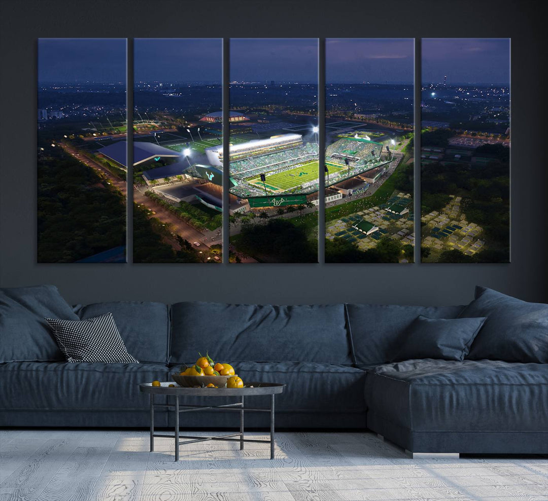 The USF Bulls Football Team Wall Art Canvas Print showcases the Tampa USF Football Stadium at night with city lights.