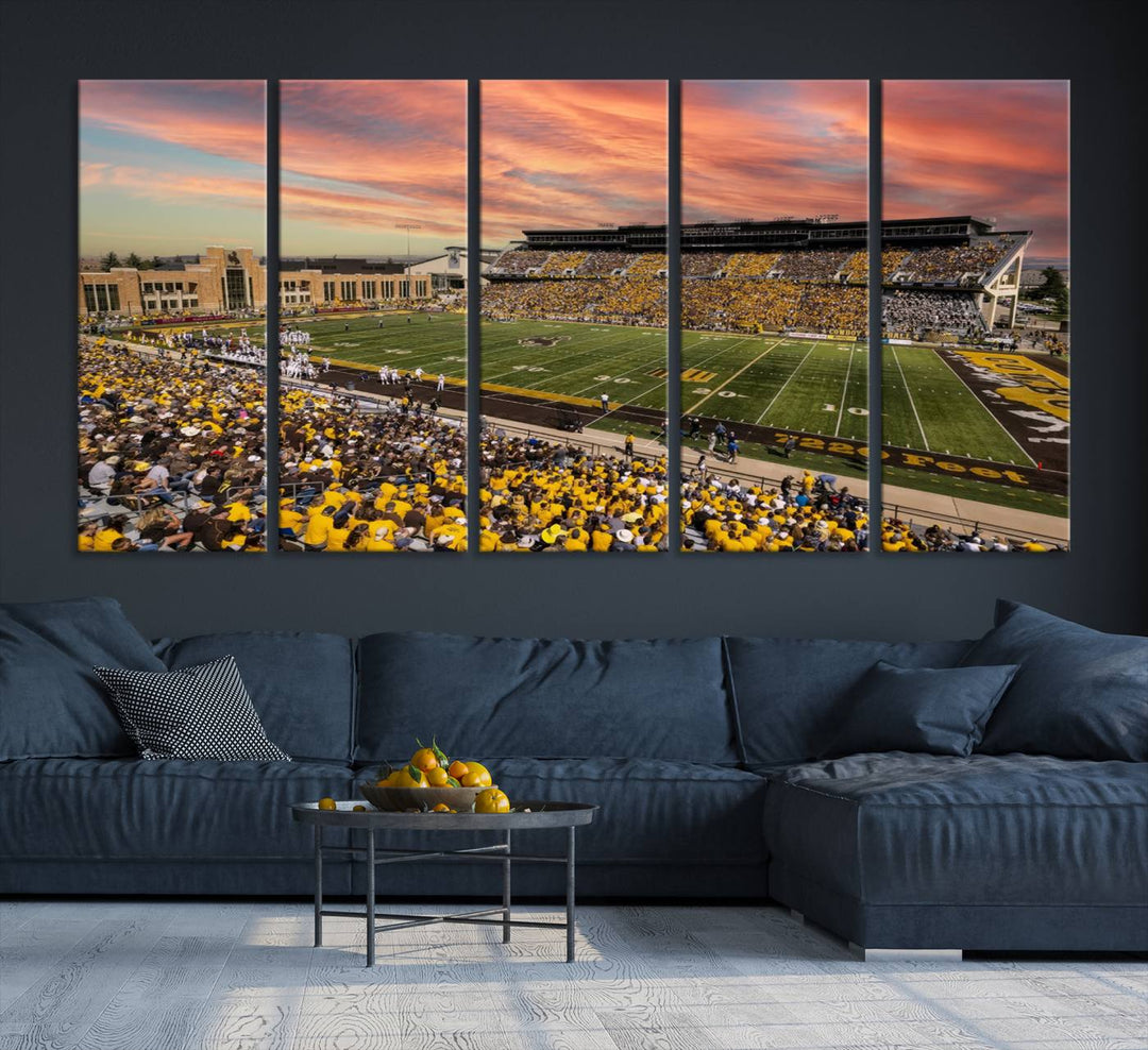 Capture the essence of a packed War Memorial Stadium at sunset with the Cowboys Football Canvas Print, highlighting fans cheering in yellow.