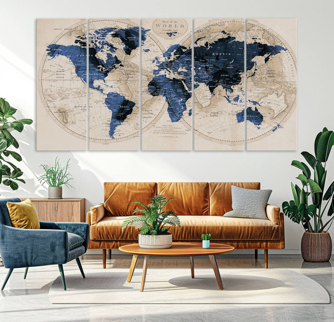 The Vintage Triptych Map Print is a grunge-stained blue and beige world map, perfect for enhancing wall decor.