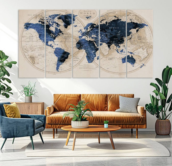 The Vintage Triptych Map Print is a grunge-stained blue and beige world map, perfect for enhancing wall decor.