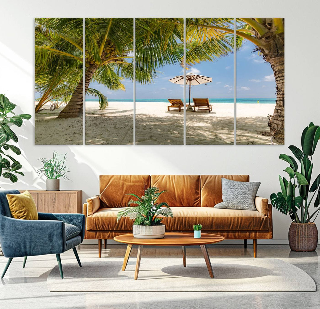 The canvas art print titled Lounge Chairs Palm Trees on Tropical Beach offers free shipping.