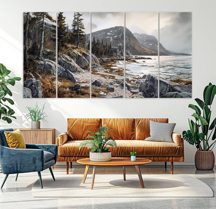 Framed wall art depicting Acadia National Parks rocky coast, trees, mountains, and sunlight over the sea; ready to hang.