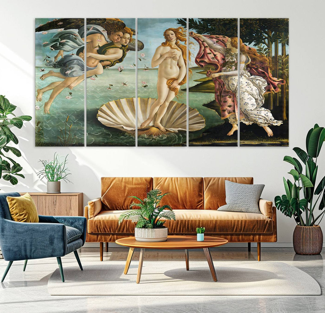 A canvas print of Botticellis The Birth of Venus is displayed on the wall.