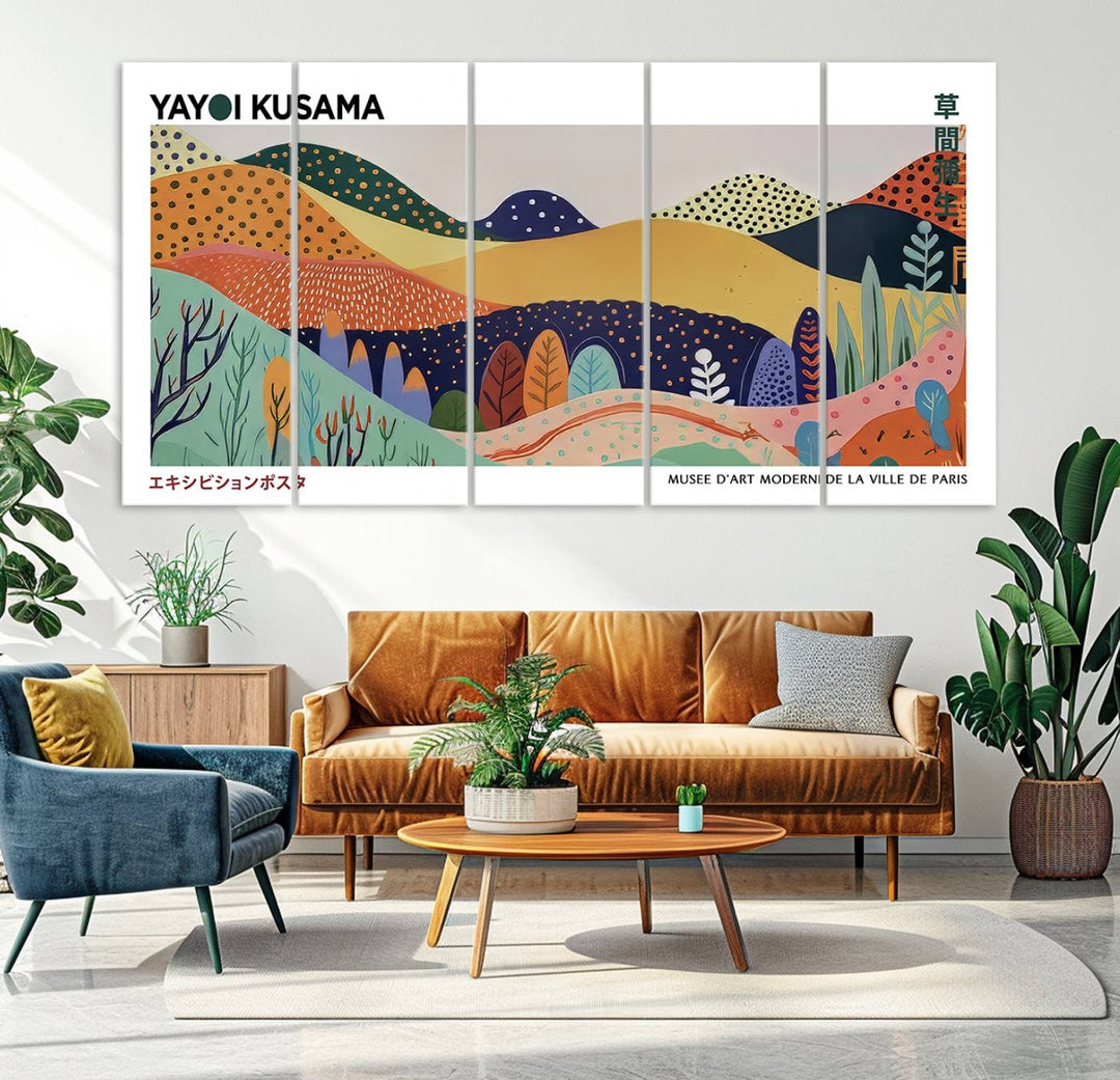 A triptych featuring the Framed Yayoi Kusama 1986 Wall Art Print hangs above. This Japanese Wabi Sabi inspired piece, rich in vibrant abstract landscapes, adds an elegant touch to any nature-inspired décor.