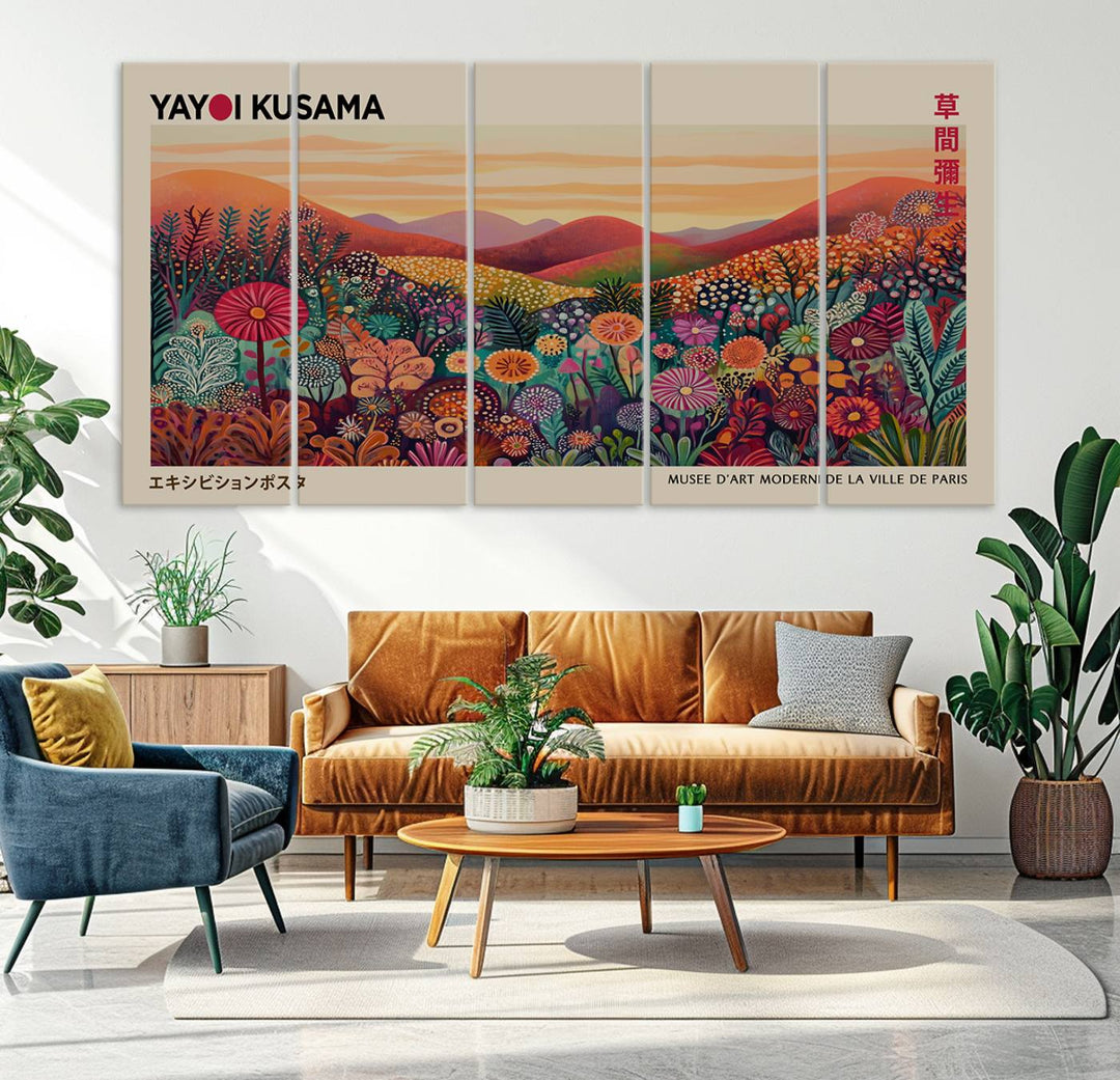 The room is adorned with a triptych artwork depicting colorful flowers and hills, incorporating the "Framed Yayoi Kusama 1986 Wall Art Print" – a vibrant abstract landscape canvas print that blends Japanese Wabi Sabi themes into contemporary nature-inspired décor.