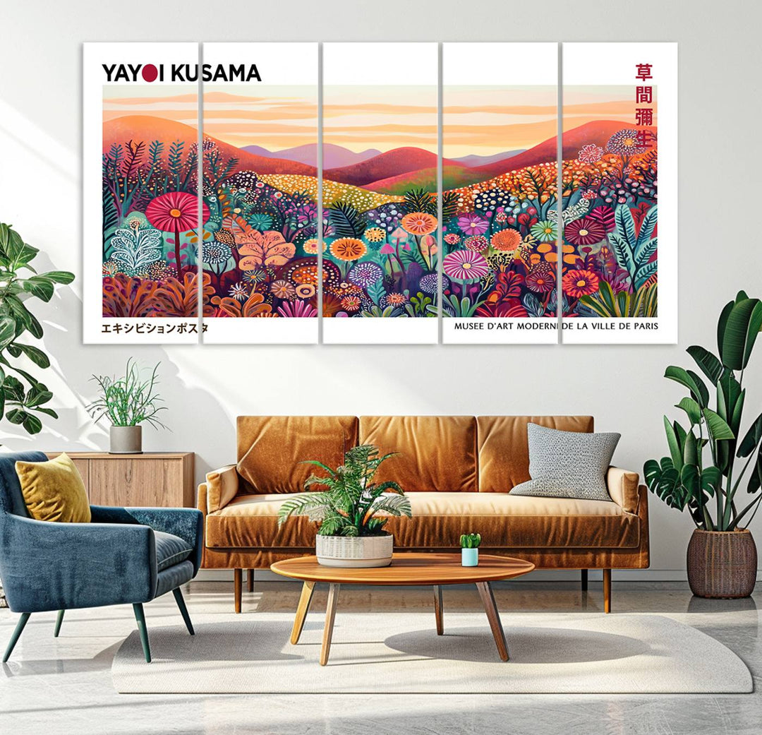 A Framed Yayoi Kusama 1986 Wall Art Print, showcasing a vibrant abstract landscape with flowers and reflecting the Wabi Sabi style, is displayed.