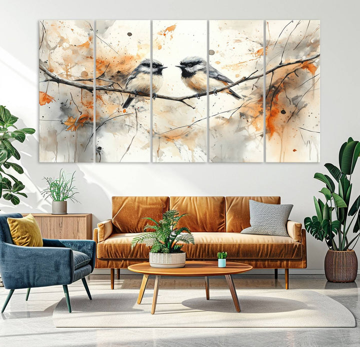 The living room features abstract watercolor chickadee bird art on the wall.