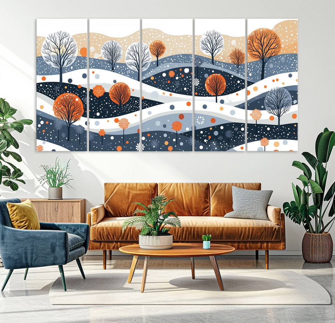 The "Abstract Winter Landscape Canvas Wall Art Print," featuring a triptych of landscapes with trees and hills in vibrant orange, white, and blue hues, adds a gallery-quality finish that transforms the space into an art lover's dream.