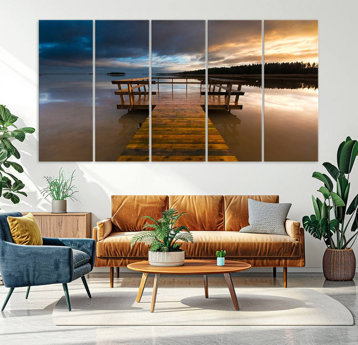 The "Serene Lake Pier at Sunset" landscape canvas print, crafted as ready-to-hang and framed wall art, enriches the contemporary setting by capturing the tranquility of a lakeside pier at sunset.