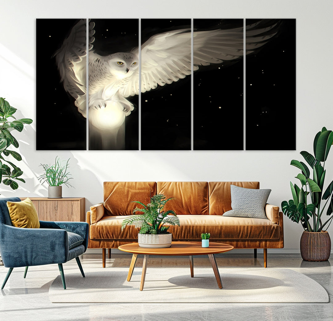 The Night Owl Art graces the wall with its depiction of a snowy owl on a glowing orb, perfect for modern decor.