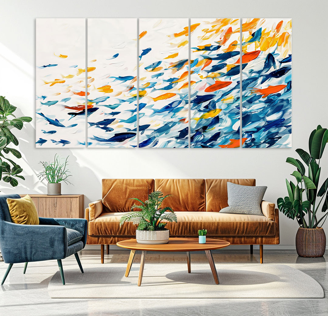 A colorful Abstract Fish Shoal Canvas Print hangs on the wall.