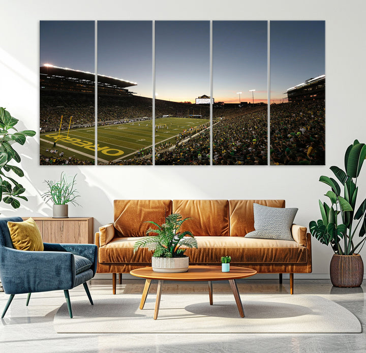 Canvas artwork depicting an Oregon Ducks football game at Autzen Stadium, capturing a sunset and packed stands.