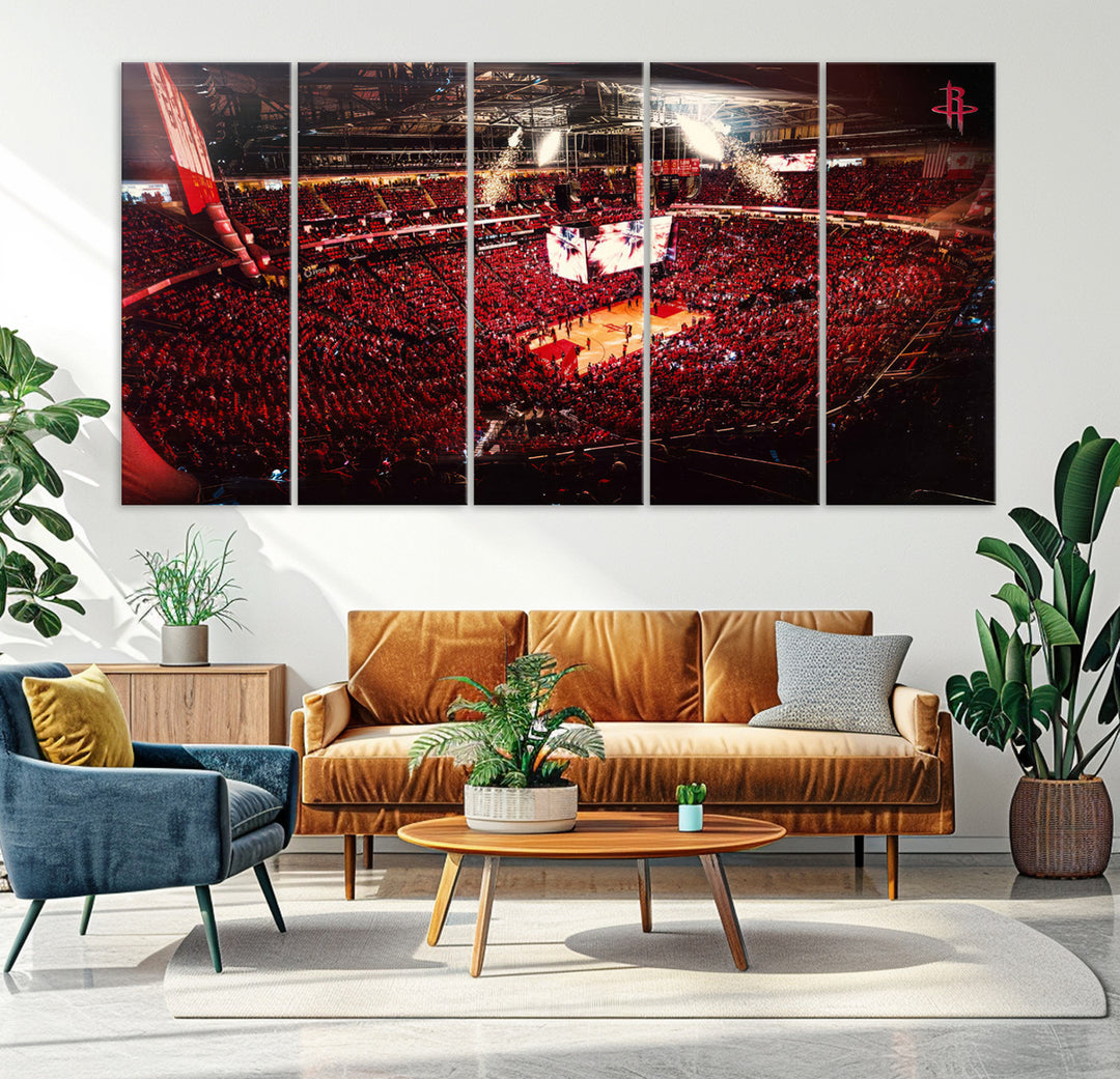 A crowded basketball arena with red lighting hosts a Houston Rockets game.