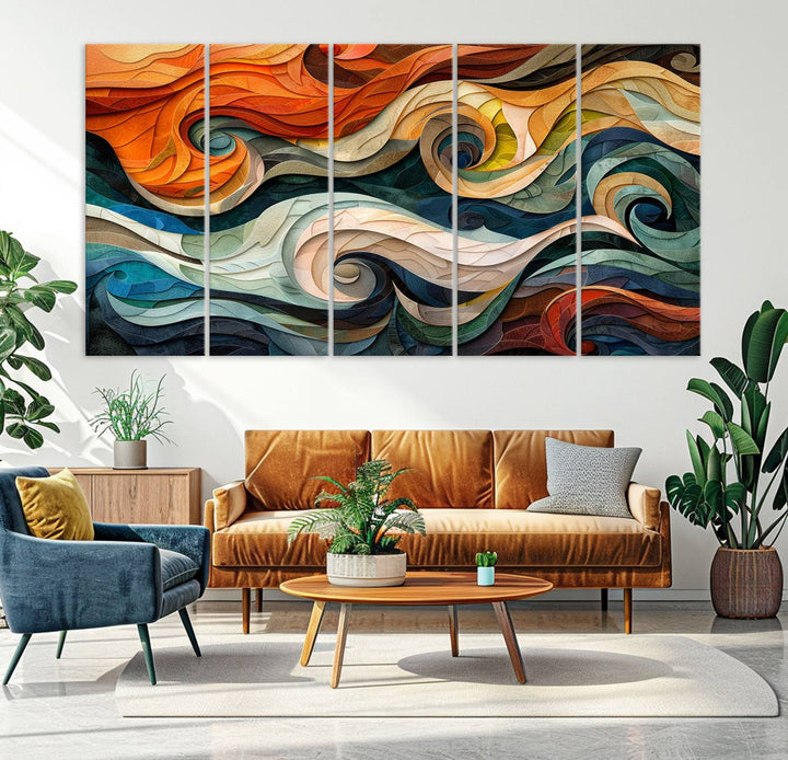 Abstract Wave Wall Art is a ready-to-hang framed canvas print featuring swirling orange, blue, and white patterns. It's perfect for adding vibrant decor to modern spaces.