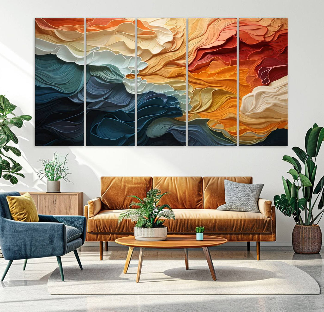 A Blue Orange Abstract Wave Wall Art Canvas Print adorns the wall. This colorful masterpiece is professionally hand-assembled to enhance any space.