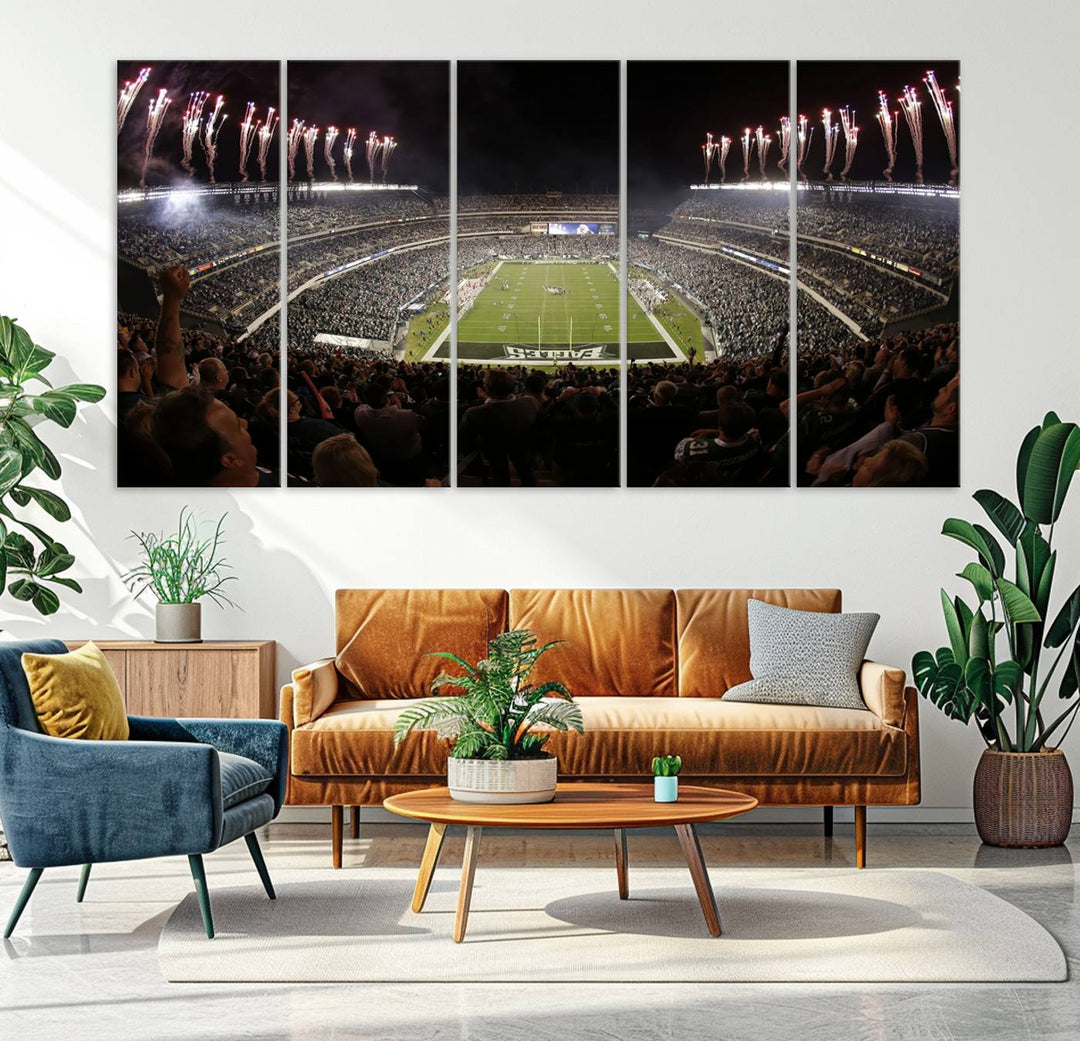 The living room features a spectacular Philadelphia Eagles Football Team Print. This wall art canvas print of Lincoln Financial Field at night captures a Philadelphia Eagles game under the dazzling brilliance of fireworks, making it an eye-catching centerpiece.