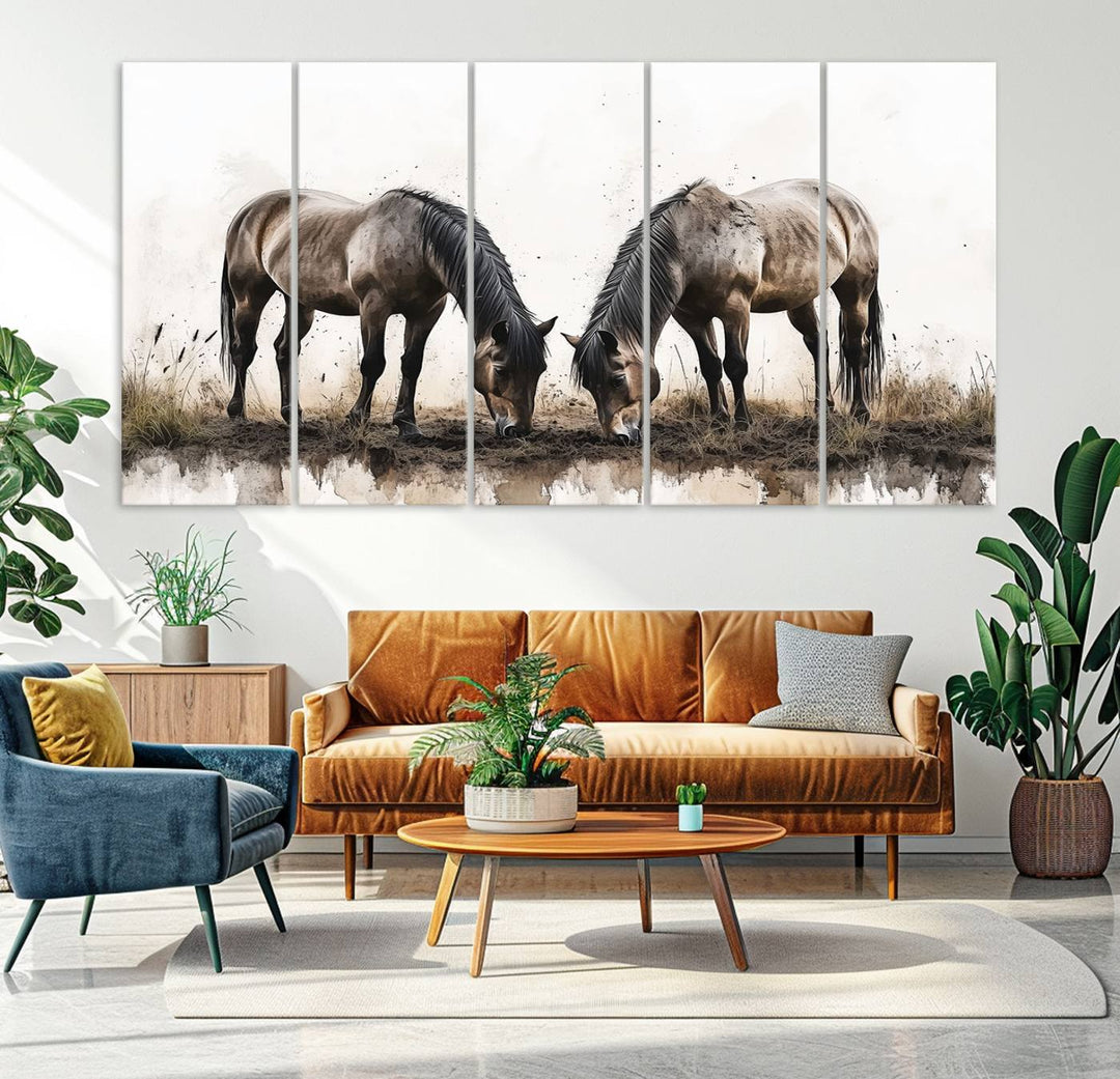 A Chinese Ink Style Horses Wall Art Canvas Print featuring two horses grazing is displayed in a modern setting.