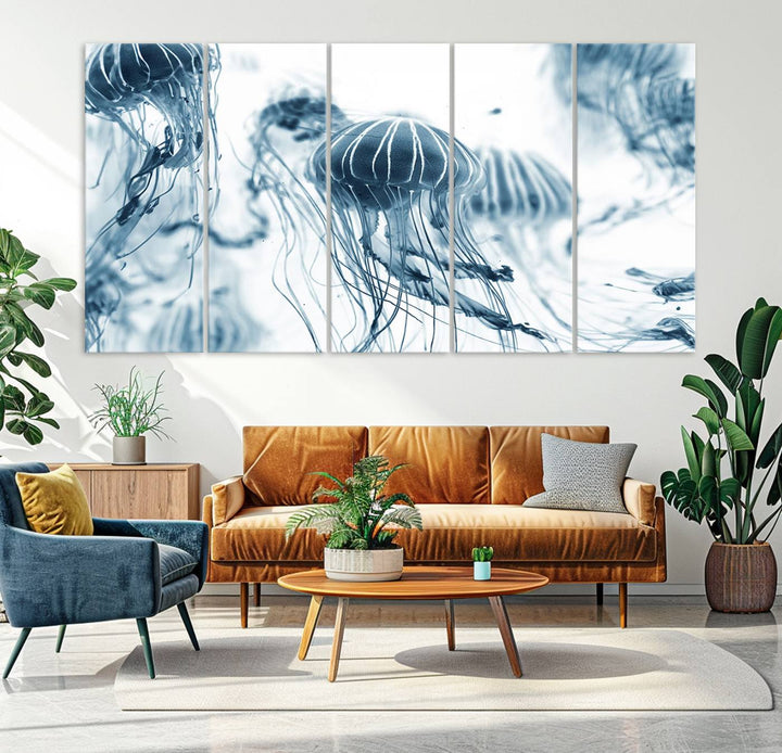 The "Abstract Jellyfish Wall Art Canvas Print" in high resolution is beautifully displayed as a triptych on a dark wall. Experience museum-quality canvas and enjoy free shipping with this stunning piece.