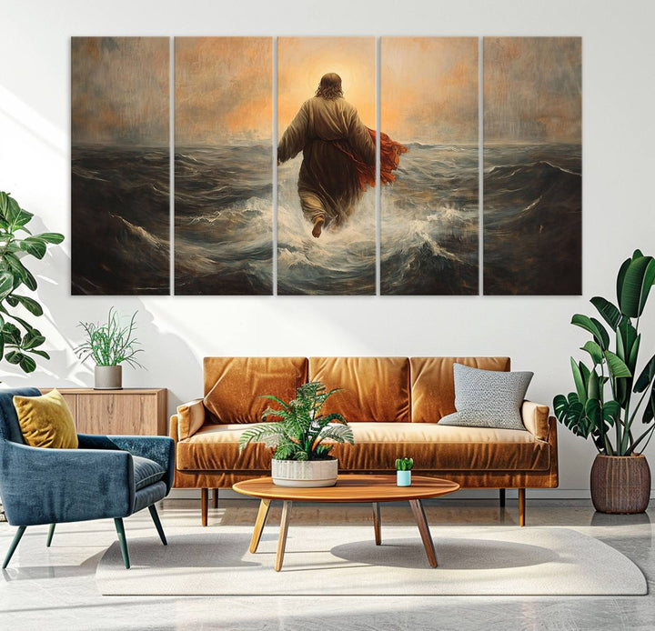 A modern living room is adorned with a triptych titled "Jesus Walking on Water, Christian Wall Art, Jesus Christ Walking on Oil Painting Style Print." The artwork, presented on museum-quality canvas, showcases vibrant colors and exquisite detail.