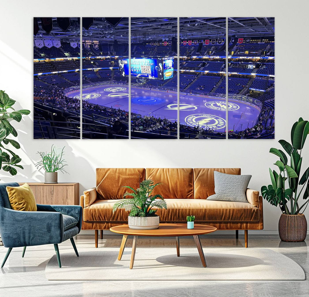 The wall art canvas print at Amalie Arena features team logos on ice, encapsulating the vibrant atmosphere of an NHL hockey stadium.