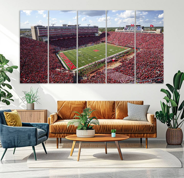 The University of Nebraska Cornhuskers Football Team Print showcases a vibrant triptych of Lincoln Memorial Stadium, depicting a packed football stadium filled with energetic fans. This handmade art piece is crafted in the USA and printed on premium canvas for a gallery-quality finish.