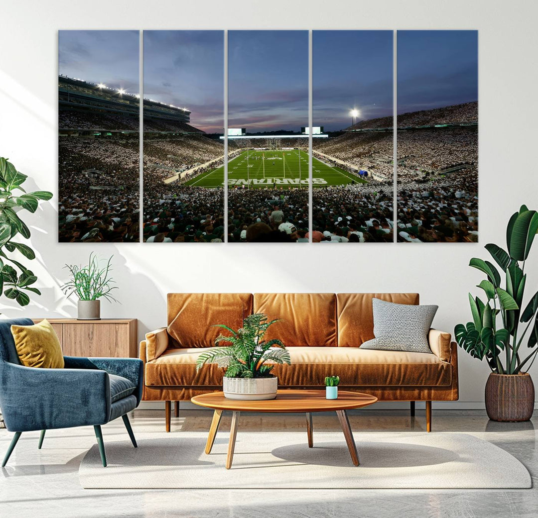 Wall art featuring a stadium at dusk with full stands—ideal for the Michigan State Spartans Football Team Canvas Print.