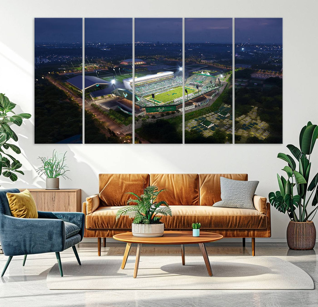 The USF Bulls Football Team Wall Art Canvas Print showcases the Tampa USF Football Stadium at night with city lights.