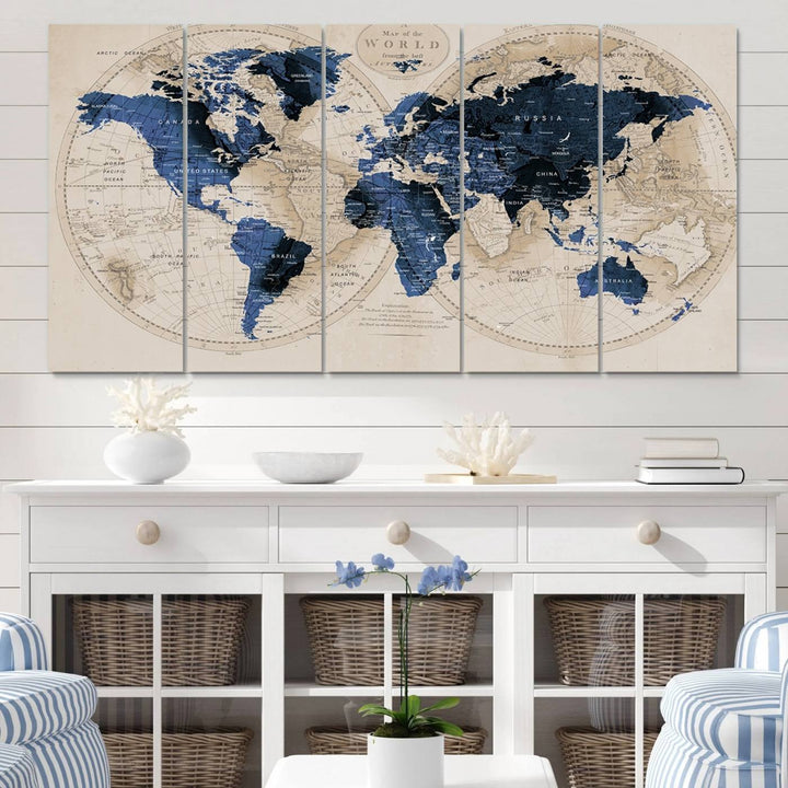 The Vintage Triptych Map Print is a grunge-stained blue and beige world map, perfect for enhancing wall decor.