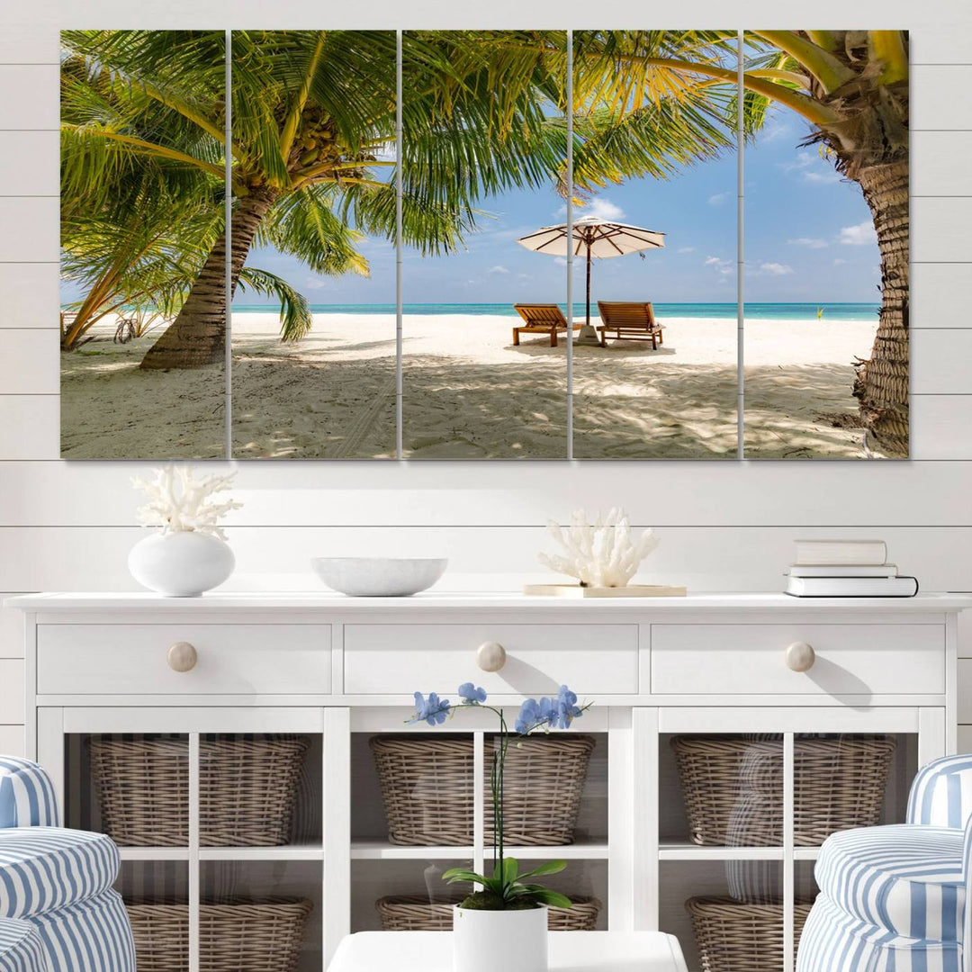 The canvas art print titled Lounge Chairs Palm Trees on Tropical Beach offers free shipping.