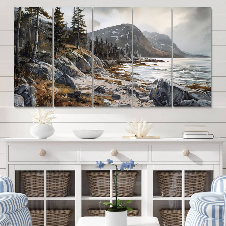 Framed wall art depicting Acadia National Parks rocky coast, trees, mountains, and sunlight over the sea; ready to hang.