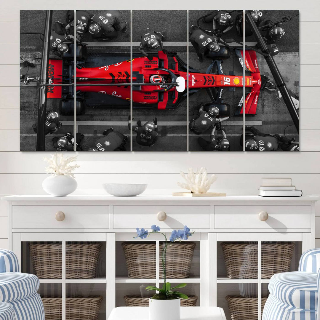 The Ferrari Pit Stop Canvas Wall Art features bold motorsport imagery that captures the precision and speed of Formula 1.