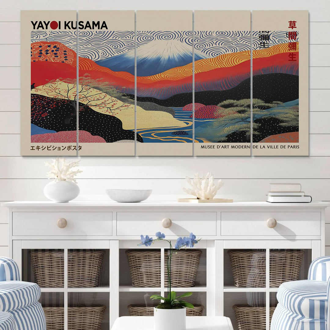 A framed Yayoi Kusama 1986 wall art print, showcasing vibrant abstract landscapes with a Wabi Sabi influence, is prominently displayed as a Japanese wall art piece.