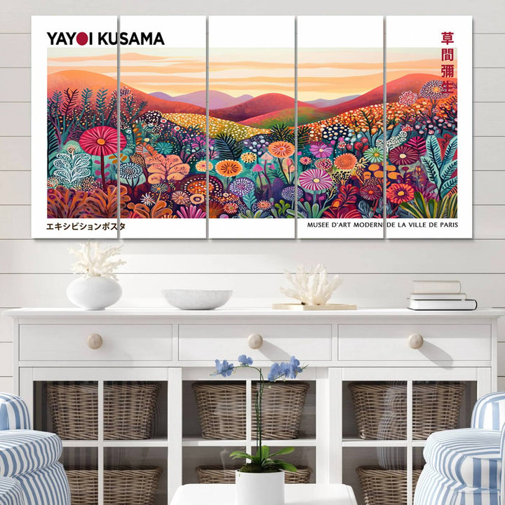 A Framed Yayoi Kusama 1986 Wall Art Print, showcasing a vibrant abstract landscape with flowers and reflecting the Wabi Sabi style, is displayed.