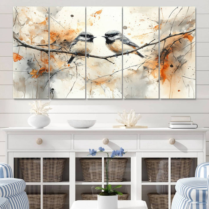 The living room features abstract watercolor chickadee bird art on the wall.