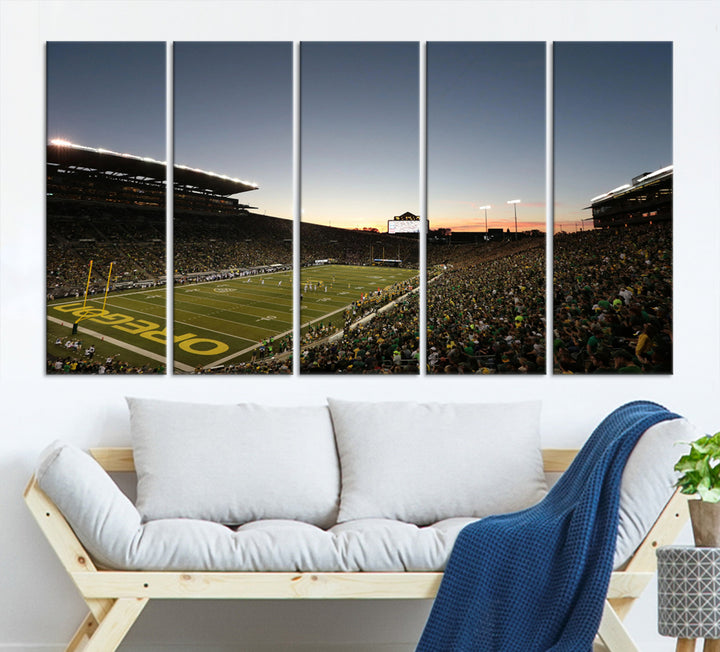 Canvas artwork depicting an Oregon Ducks football game at Autzen Stadium, capturing a sunset and packed stands.