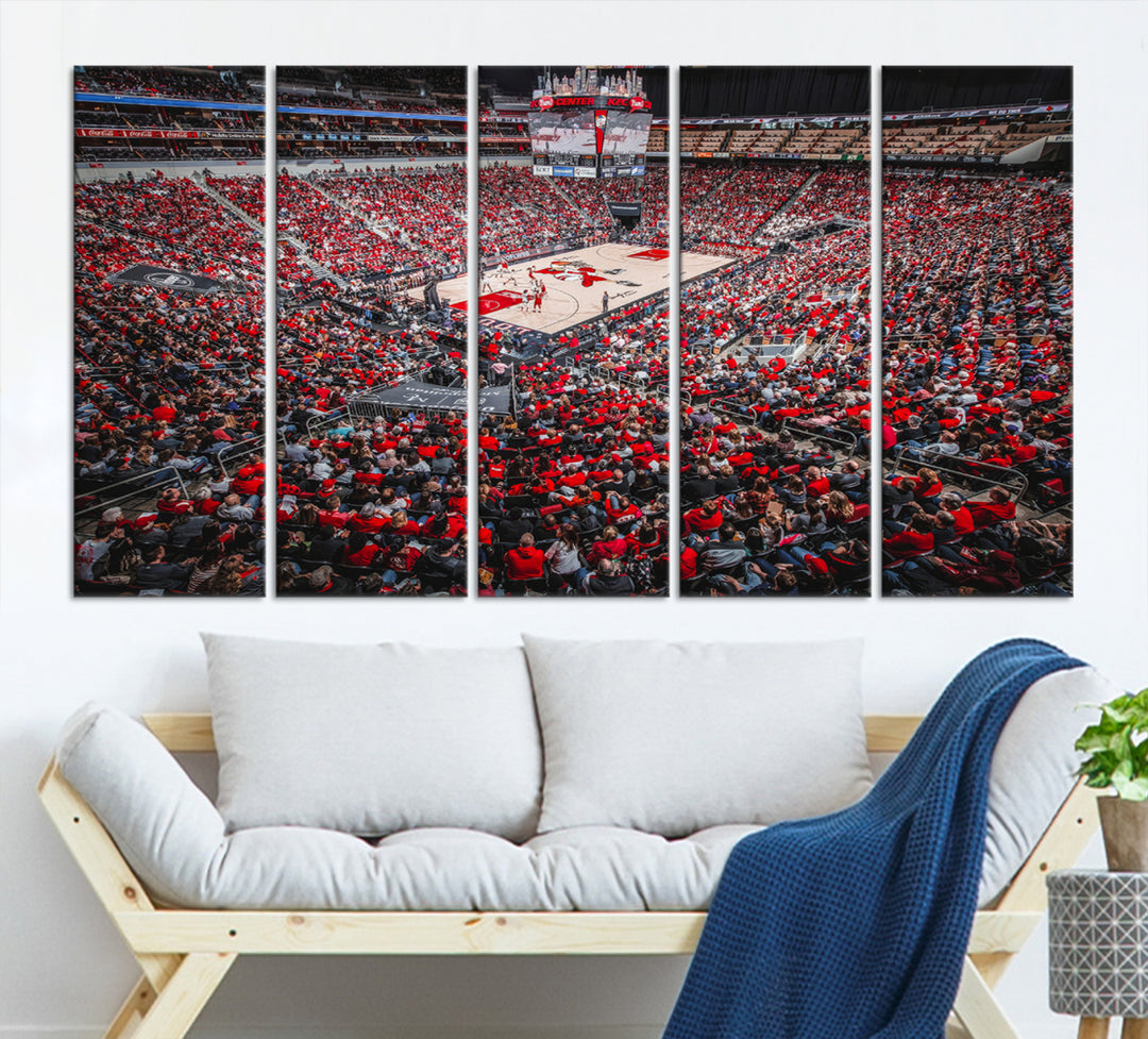 A painting of Louisville Cardinals fans in red at the KFC Yum Center Arena.