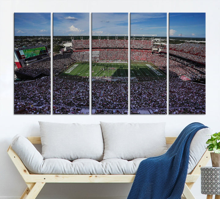 The wall art is a South Carolina Gamecocks print, showcasing Williams-Brice Stadium from a distance under clear skies.