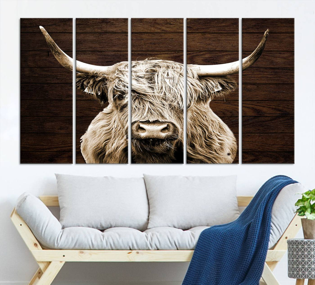 Highland Cow Wall Art Canvas Print: Majestic Scottish bull on rustic decor, ready to hang.