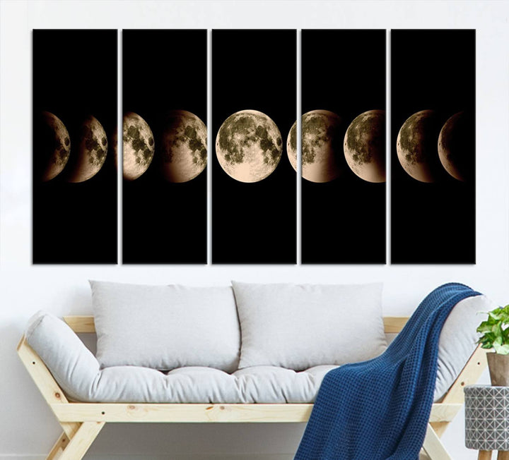 The "Phases of the Moon Wall Art" canvas print elegantly hangs on the wall.