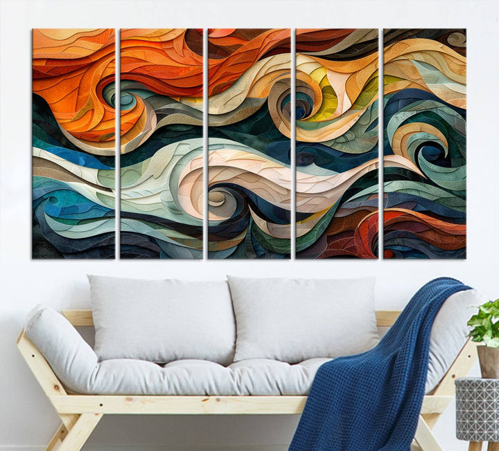 Abstract Wave Wall Art is a ready-to-hang framed canvas print featuring swirling orange, blue, and white patterns. It's perfect for adding vibrant decor to modern spaces.