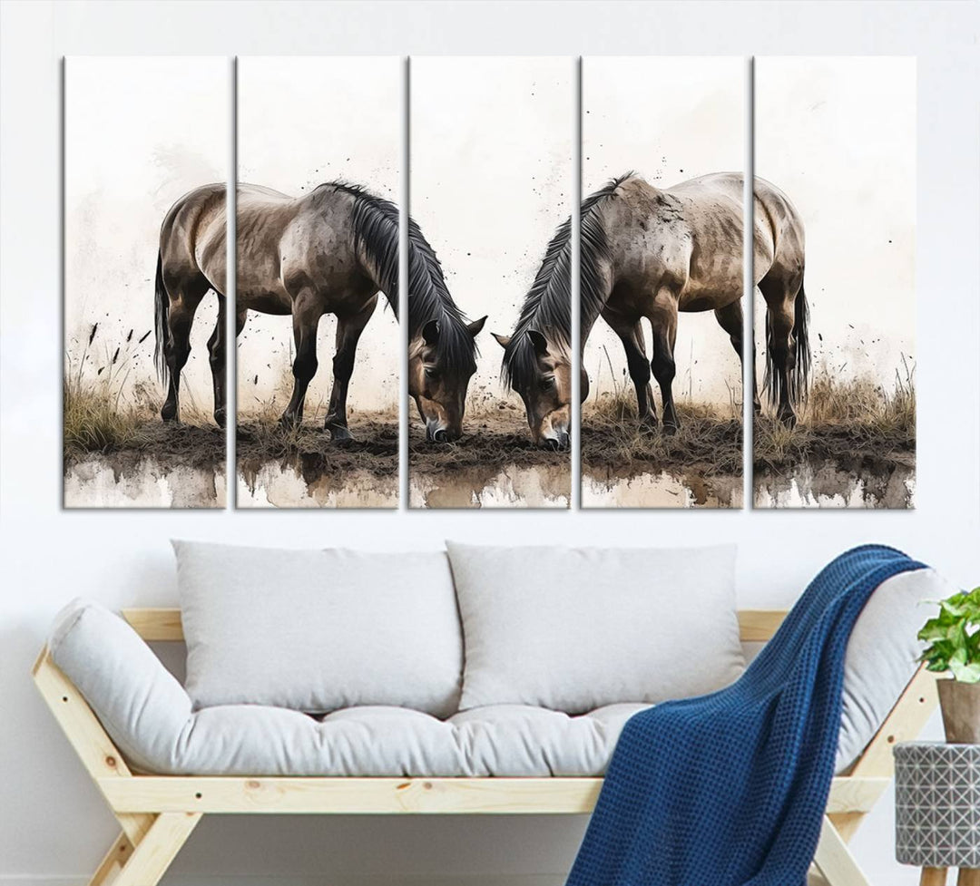 A Chinese Ink Style Horses Wall Art Canvas Print featuring two horses grazing is displayed in a modern setting.