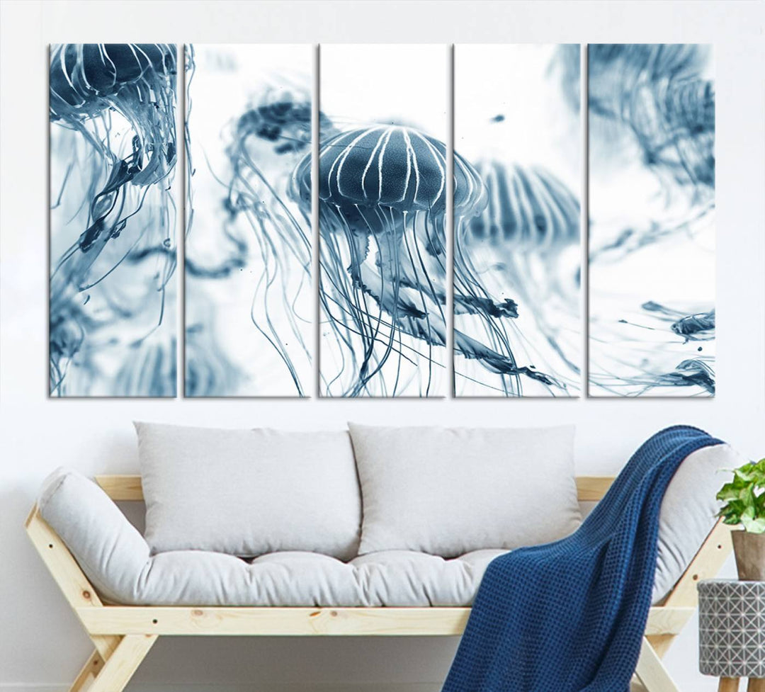 The "Abstract Jellyfish Wall Art Canvas Print" in high resolution is beautifully displayed as a triptych on a dark wall. Experience museum-quality canvas and enjoy free shipping with this stunning piece.